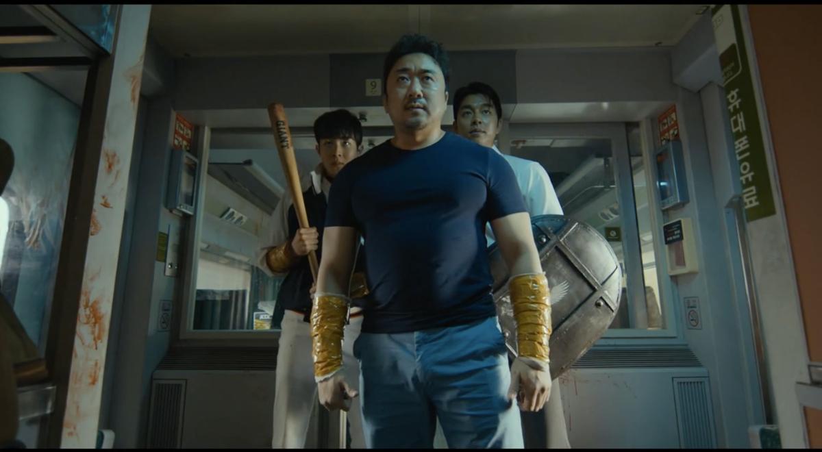 A picture of Ma Dong-seok in Train to Busan looking heroic